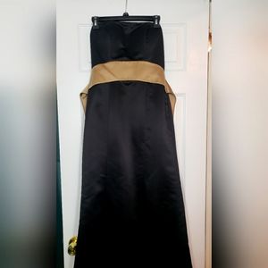 Strapless back gown with gold sash